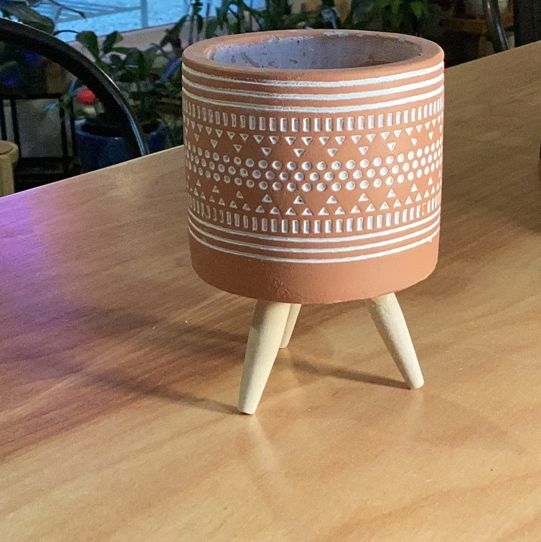 Tribal planter on wooden legs